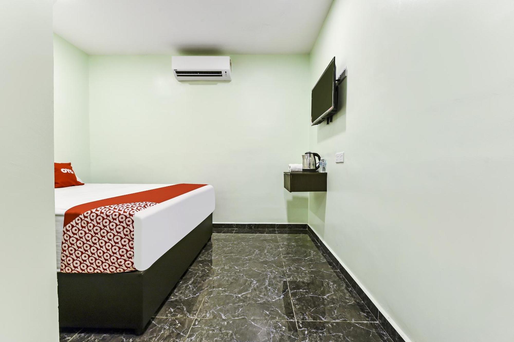 Oyo 90445 Th Hotel 伯豪 外观 照片