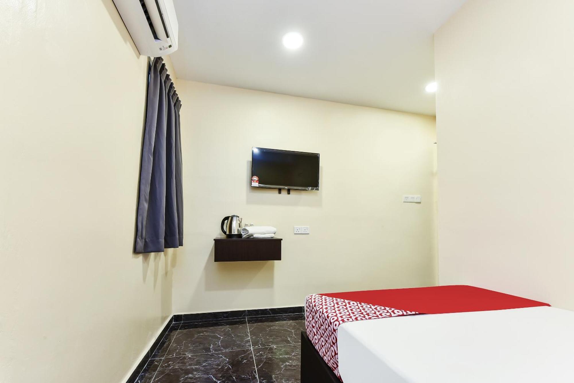 Oyo 90445 Th Hotel 伯豪 外观 照片